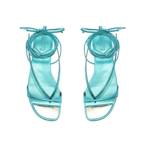 Schutz | Women's Vikki Flat Metallic Leather Sandal-Turquesa
