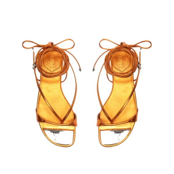 Schutz | Women's Vikki Flat Metallic Leather Sandal-Orange